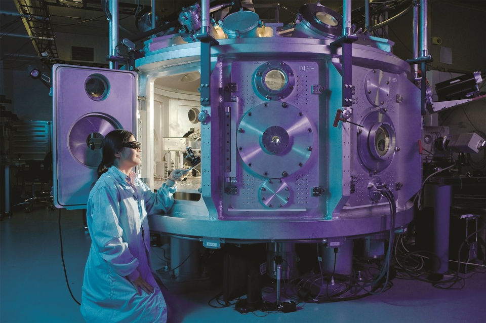 Woman looking inside a turbine